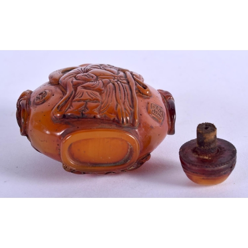 785 - A CHINESE AMBER TYPE SNUFF BOTTLE 20th Century. 52 grams. 7 cm x 5.25 cm.