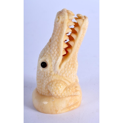 792 - A JAPANESE BONE CROCODILE. 61 grams. 6.75 cm x 3.5 cm.