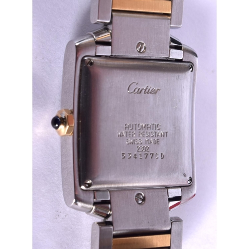 796 - A CARTIER TWO TONE WRISTWATCH with paperwork. 106 grams. 2.75 cm square.