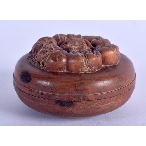 799 - A JAPANESE BOXWOOD BOX AND COVER. 6.5 cm wide.