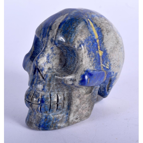 801 - A CONTINENTAL LAPIS LAZULI SKULL. 356 grams. 6.5 cm x 6.5 cm.