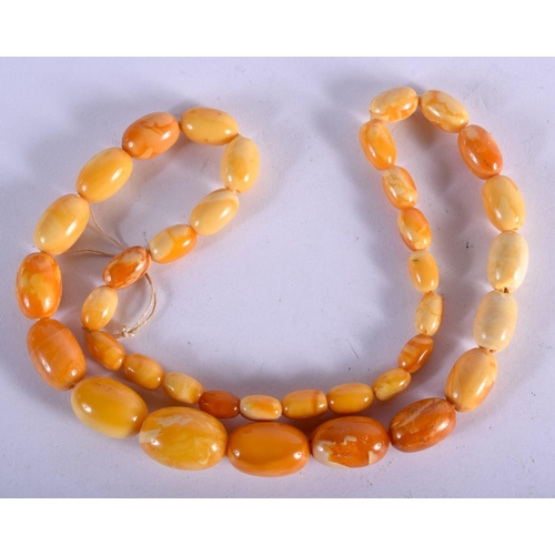 820 - AN AMBER NECKLACE. 21.5 grams. 47 cm long.