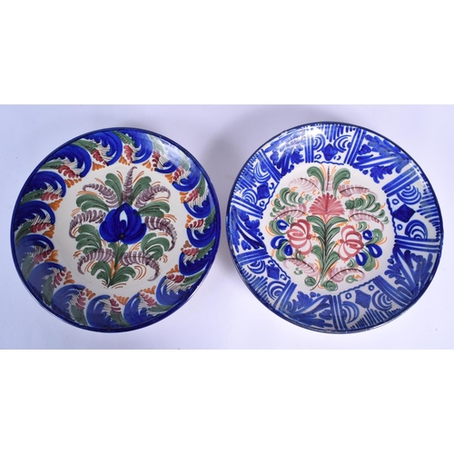 83 - SEVEN LARGE STYLISH SPANISH POTTERY DISHES modelled in the 17th/18th century style. Largest 27 cm di... 