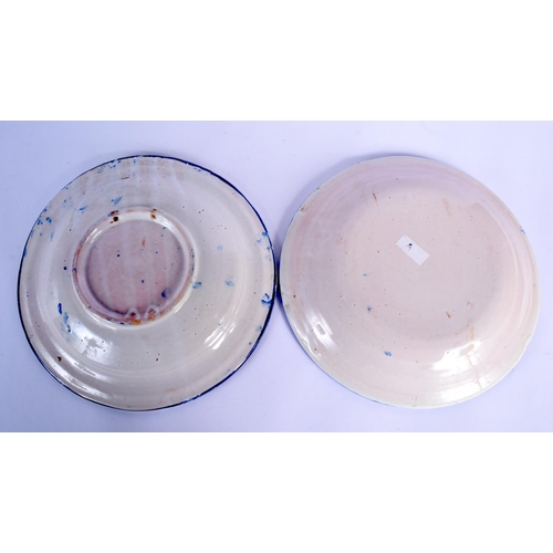 83 - SEVEN LARGE STYLISH SPANISH POTTERY DISHES modelled in the 17th/18th century style. Largest 27 cm di... 