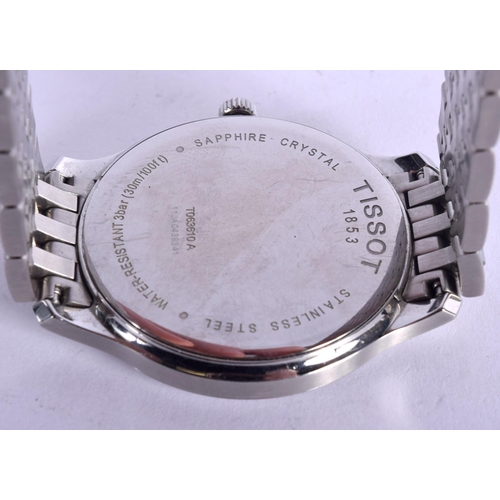 840 - A TISSOT WRISTWATCH. 113 grams. 4.5 cm wide inc winder.