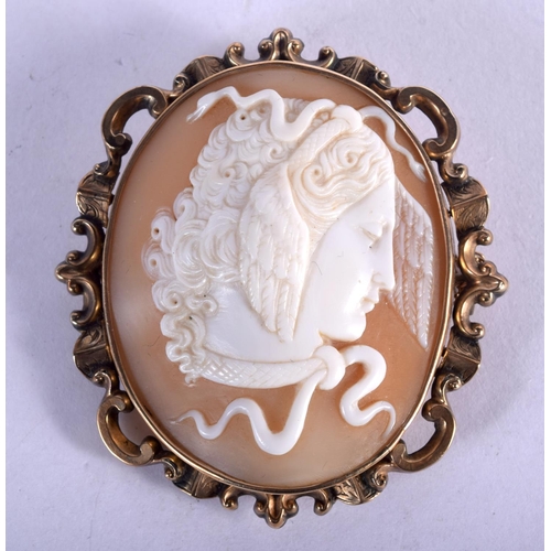 848 - A 9CT GOLD MOUNTED CAMEO BROOCH. 18 grams. 5 cm x 3.5 cm.