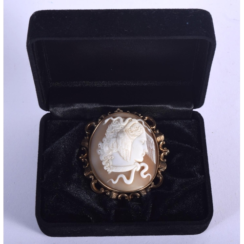 848 - A 9CT GOLD MOUNTED CAMEO BROOCH. 18 grams. 5 cm x 3.5 cm.