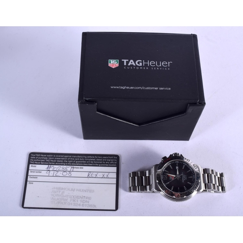 850 - A GENTLEMANS TAGHEUER FORMULA 1 WRISTWATCH. 129 grams. 4.5 cm wide.