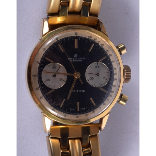 852 - A BREITLING TOP TIME YELLOW METAL WRISTWATCH with black dial. 4 cm wide inc crown. 92.8 grams.