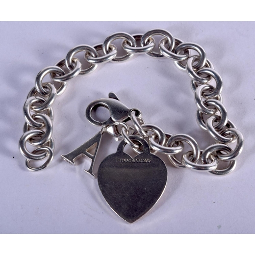 855 - A TIFFANY & CO SILVER BRACELET. 35 grams. 18 cm long.