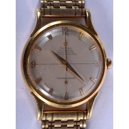 861 - AN 18CT GOLD  OMEGA CONSTELLATION WRISTWATCH. 74 grams. 3.5 cm wide inc winder.