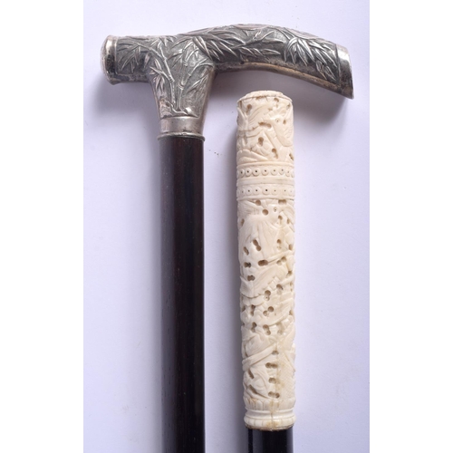 868 - A 19TH CENTURY CHINESE EXPORT SILVER HANDLED WALKING CANE together with a Canton ivory walking cane.... 