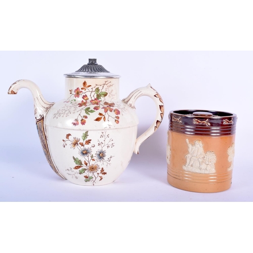 87 - A RARE ANTIQUE DOULTON POTTERY SELF POURING TEAPOT together with a Doulton stoneware jar and cover. ... 