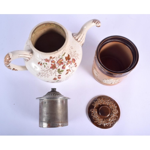87 - A RARE ANTIQUE DOULTON POTTERY SELF POURING TEAPOT together with a Doulton stoneware jar and cover. ... 