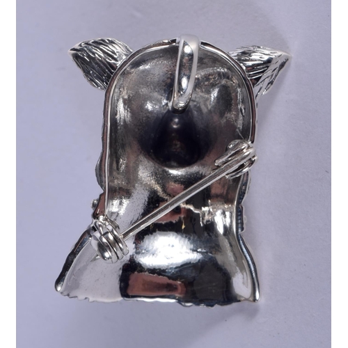 883 - A SILVER DOG BROOCH. 10 grams. 3 cm x 2.25 cm.