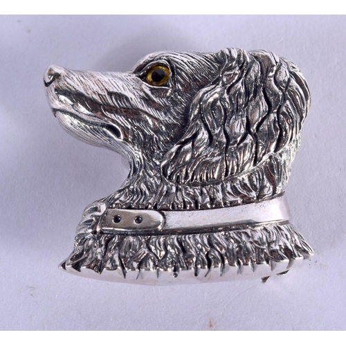 894 - A SILVER DOG BROOCH. 11 grams. 2.75 cm x 3 cm.