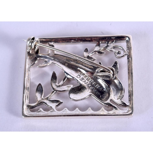 895 - A DANISH SILVER DOLPHIN BROOCH. 10 grams. 3.5 cm x 2.75 cm.