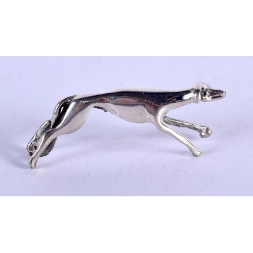 897 - A SILVER GREYHOUND. 3.7 grams. 3.25 cm wide.