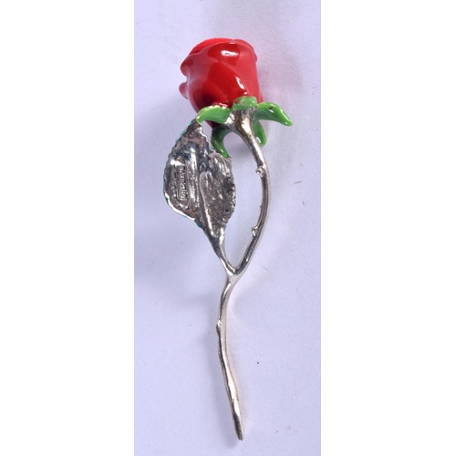 899 - A SILVER AND ENAMEL ROSE. 6.8 grams. 5.75 cm x 2 cm.