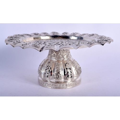 905 - AN INDIAN SILVER HEAVILY EMBOSSED TAZZA.  19.5cm diameter, 8cm high, weight 263g