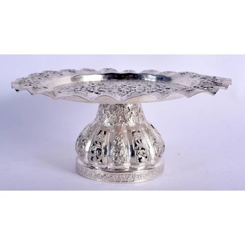 905 - AN INDIAN SILVER HEAVILY EMBOSSED TAZZA.  19.5cm diameter, 8cm high, weight 263g