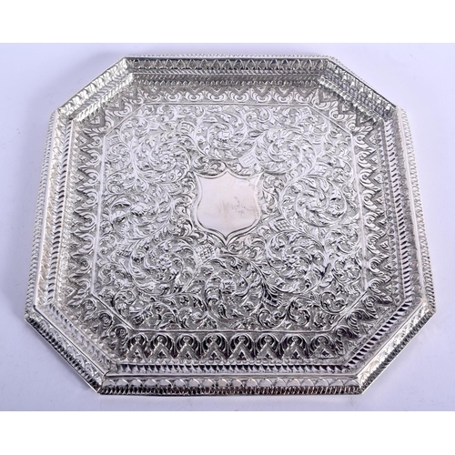 911 - AN INDIAN WHITE METAL OCTAGONAL TRAY WITH VACANT CARTOUCHE.  17.5cm square, weight 409g