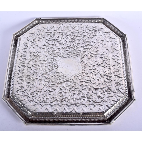 911 - AN INDIAN WHITE METAL OCTAGONAL TRAY WITH VACANT CARTOUCHE.  17.5cm square, weight 409g