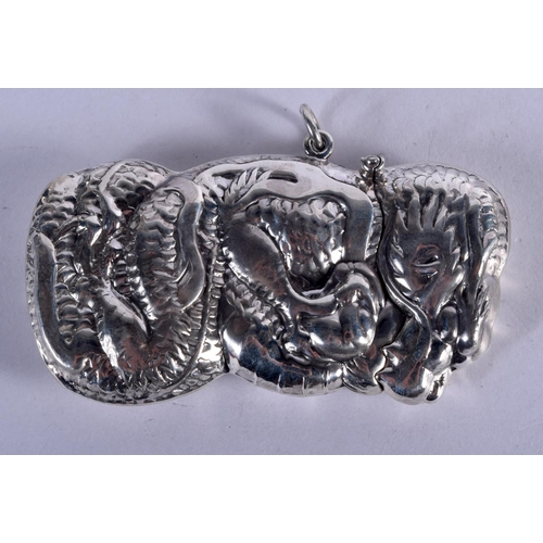 920 - A STERLING SILVER VESTA CASE IN THE SHAPE OF AN ORIENTAL DRAGON.  7.4xm x 4.4cm, weight 31.6g