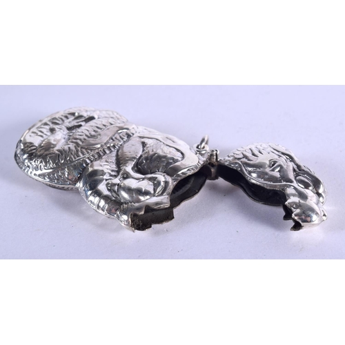 920 - A STERLING SILVER VESTA CASE IN THE SHAPE OF AN ORIENTAL DRAGON.  7.4xm x 4.4cm, weight 31.6g