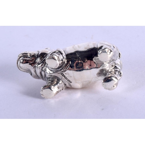 921 - A STERLING SILVER HIPPO.  3.6cm x 1.7cm, weight 19.1g