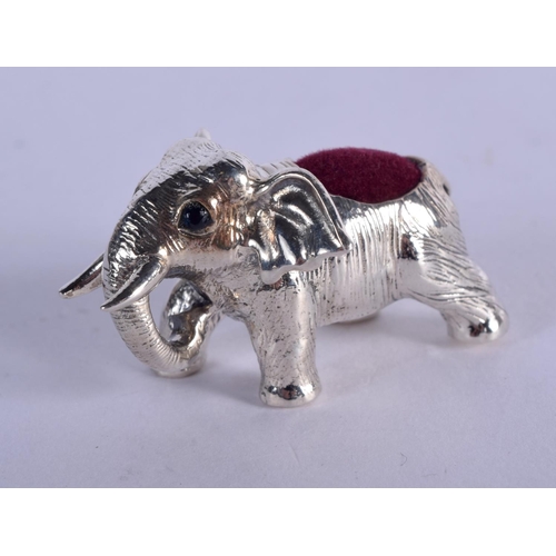 923 - A STERLING SILVER PIN CUSHION IN THE FORM OF A BABY ELEPHANT.  4cm x 2.2cm, weight 20g