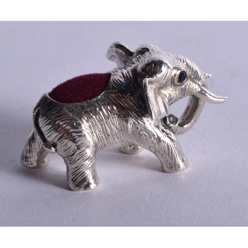 923 - A STERLING SILVER PIN CUSHION IN THE FORM OF A BABY ELEPHANT.  4cm x 2.2cm, weight 20g