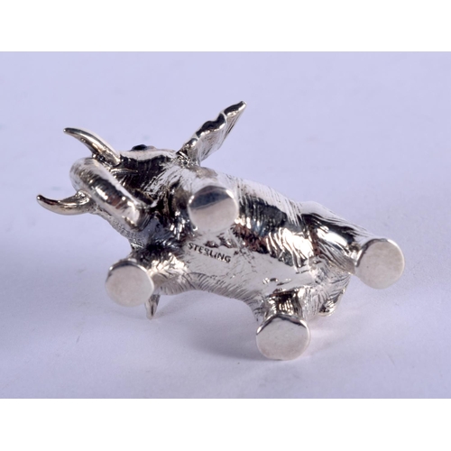 923 - A STERLING SILVER PIN CUSHION IN THE FORM OF A BABY ELEPHANT.  4cm x 2.2cm, weight 20g