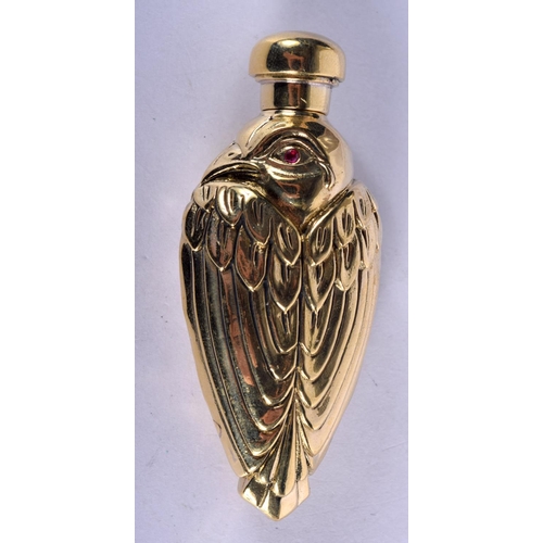 924 - A SCENT BOTTLE IN THE FORM OF A BIRD WITH GEM SET EYES.  7.7cm x 3.3cm, weight 62.9g