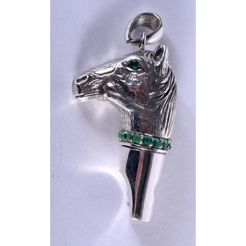 925 - A STERLING SILVER HORSE HEAD WHISTLE WITH GEM INSET EYES AND COLLAR.  3.9cm x 2.2cm, weight 16.5g