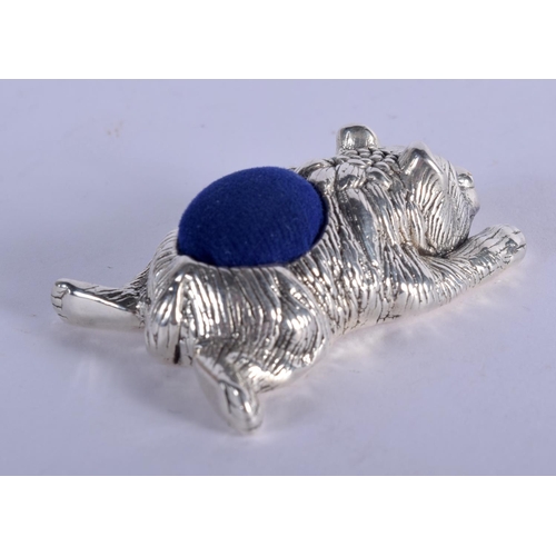 926 - A PIN CUSHION IN THE FORM OF A SPRAWLING BEAR.  Stamped 925, 5.3cm x 3.7cm x 1.8cm, weight 25.5g