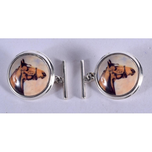 928 - A PAR OF ENAMELED HORSE HEAD CUFFLINKS.  Stamped 925, 1.9cm diameter, weight 9.9g