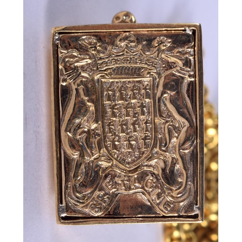 931 - A YELLOW METAL SEAL PENDANT WITH A BOAR ON TOP SUSPENDED ON A CHAIN.  Pendant .1cm x 3cm, Chain 82cm... 