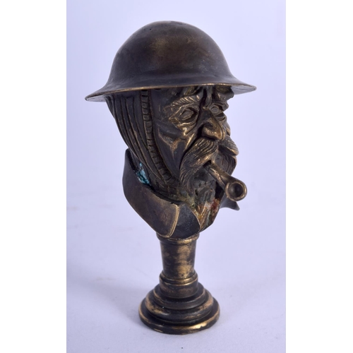 933 - A PIPE TAMPER IN FORM OF A WW1 SOLDIER SMOKING A PIPE.  6.3cm x 3.5cm, weight 51.8g