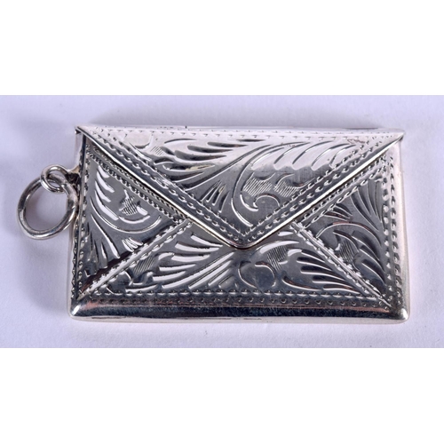 941 - A SILVER TWO COMPARTMENT STAMP CASE IN THE FORM OF AN ENVELOPE.  Stamped 925, 4.5cm x 2.7cm, weight ... 