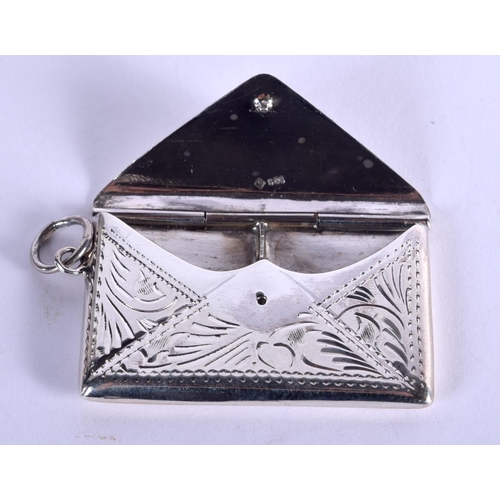 941 - A SILVER TWO COMPARTMENT STAMP CASE IN THE FORM OF AN ENVELOPE.  Stamped 925, 4.5cm x 2.7cm, weight ... 