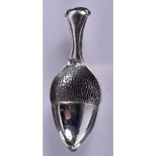 957 - A SILVER ACORN SHAPED CADDY SPOON.  Stamped 925, 8.4cm x 3.3cm weight 11.7g