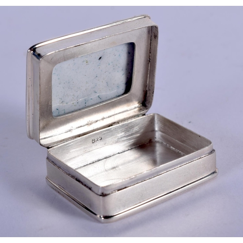 960 - A SILVER AND ENAMEL PILL BOX DECORATED WITH A FEMALE IN A YELLOW DRESS.  3.1cm x 2.5cm, weight 15.9g