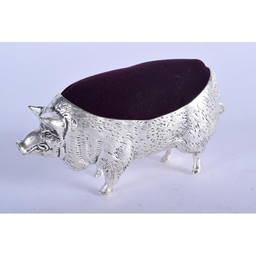 963 - A CONTINENTAL SILVER PIG PIN CUSHION.  Stamped 800, 10.7cm x 5.8cm, weight 129.4g