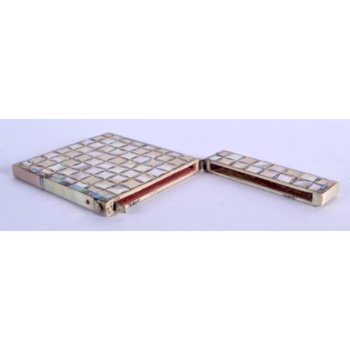 971 - A MOTHER OF PEARL CARD CASE.  10cm x 8cm, weight 39g