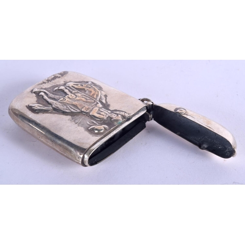 975 - A STERLING SILVER VESTA CASE EMBOSSED WITH A COWBOY.  Stamped Sterling, 7.5cm x 5.1cm, weight 43g