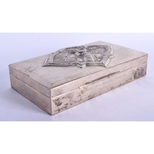 977 - AN ORIENTAL SILVER BOX WITH EMBOSSED SILVER LID.  Stamped Bangkok Sterling, 15cm x 9cm x 4cm, weight... 