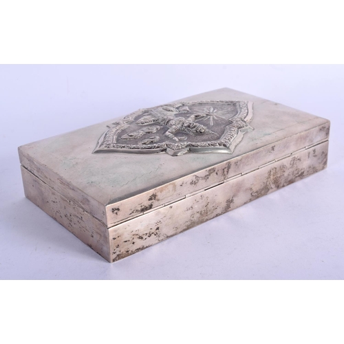 977 - AN ORIENTAL SILVER BOX WITH EMBOSSED SILVER LID.  Stamped Bangkok Sterling, 15cm x 9cm x 4cm, weight... 