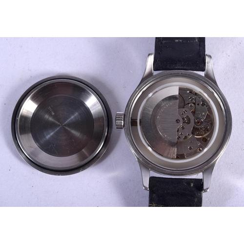 979 - A MWC MILITATY WRISTWATCH MARKED AS 2063.  Dial 4.3cm (inc crown), weight 56g