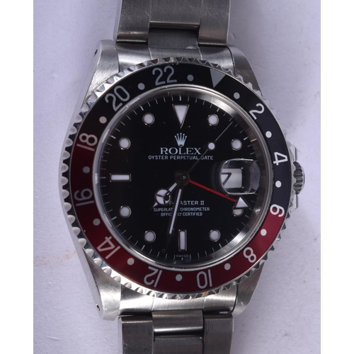 988 - A BOXED ROLEX GMT-MASTER II COKE WRISTWATCH with paperwork and tag. 119 grams. 4.25 cm inc crown.

P... 